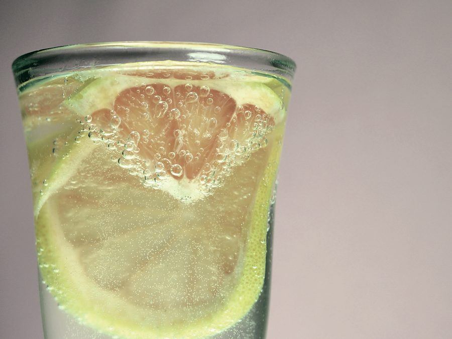 Citrus slices in a glass of sparkling water