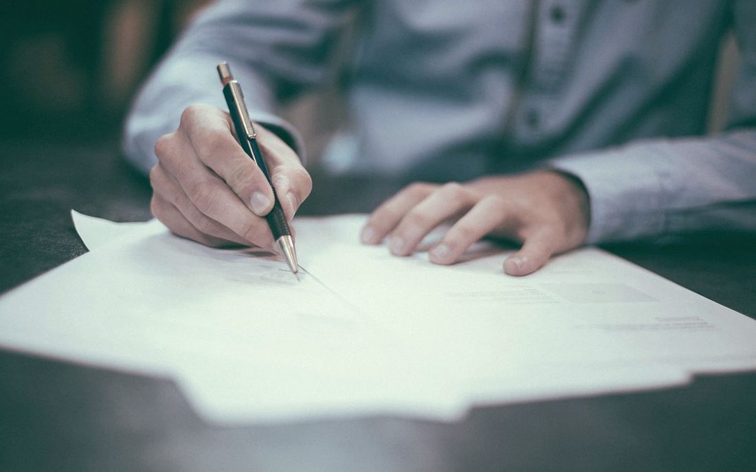 Signing off an IFRA compliance document at the Velmora bench