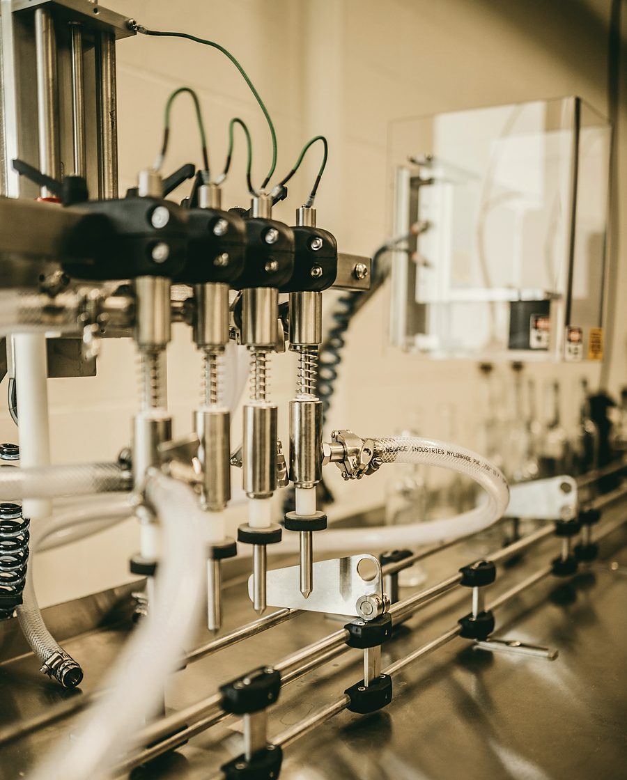 Filling line nozzles on a personal care production line